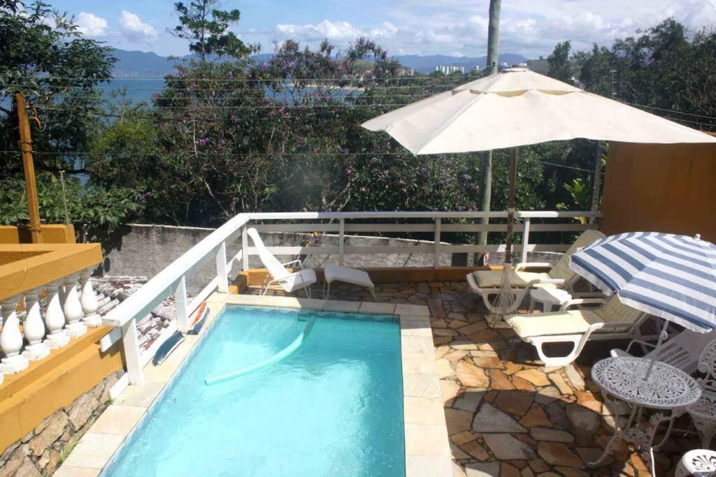 Por De Sol No Mar Da Cama Villa Caraguatatuba Exterior photo